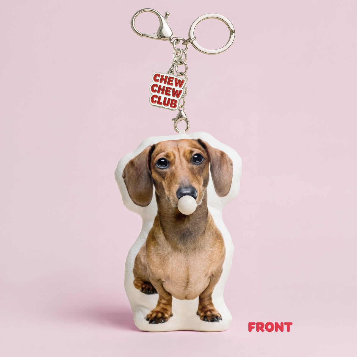 Front of custom Dachshund dog plush keychain from a pet photo with bubble-blowing feature and Chew Chew Club charm