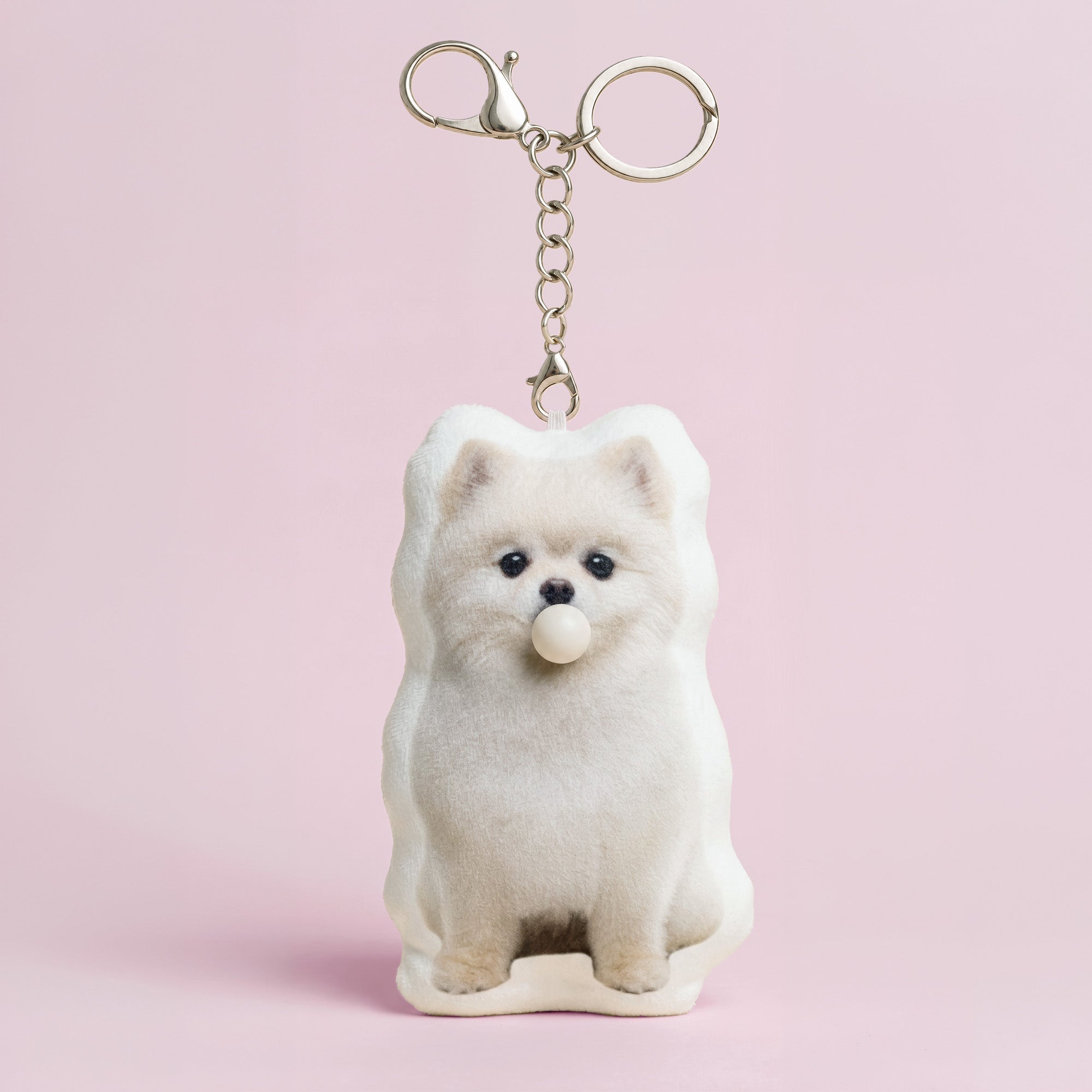 Cute white Pomeranian dog plush keychain front view with bubble in mouth